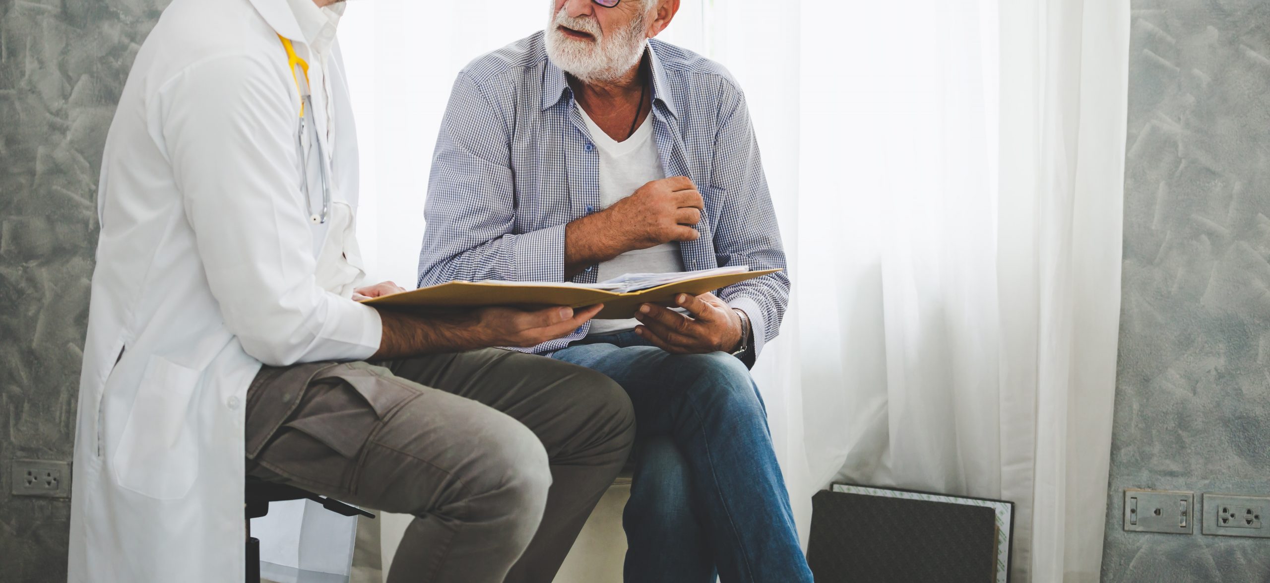 Professional psychologist doctor discussing with patient in therapy sessions at hospital room, Medical and Behavioral Health concept